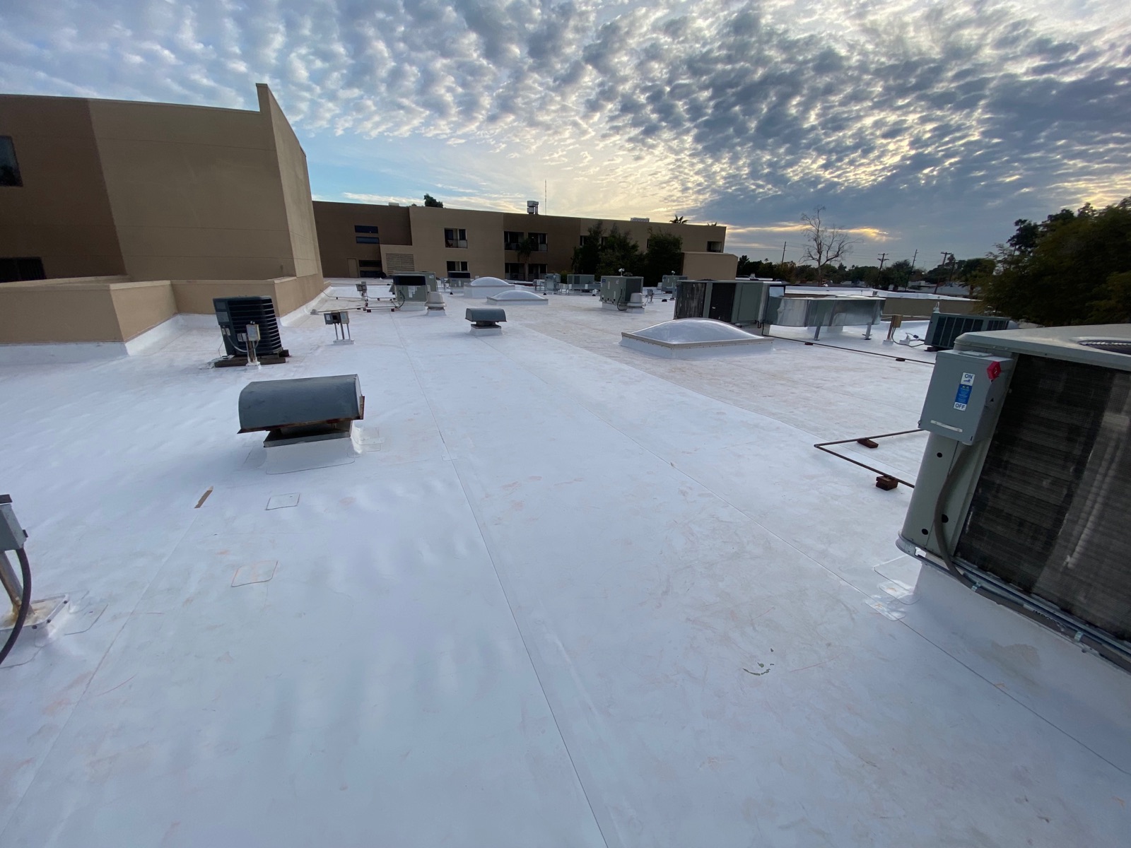 Completed white single-ply roofing system installed by Phoenix Single Ply